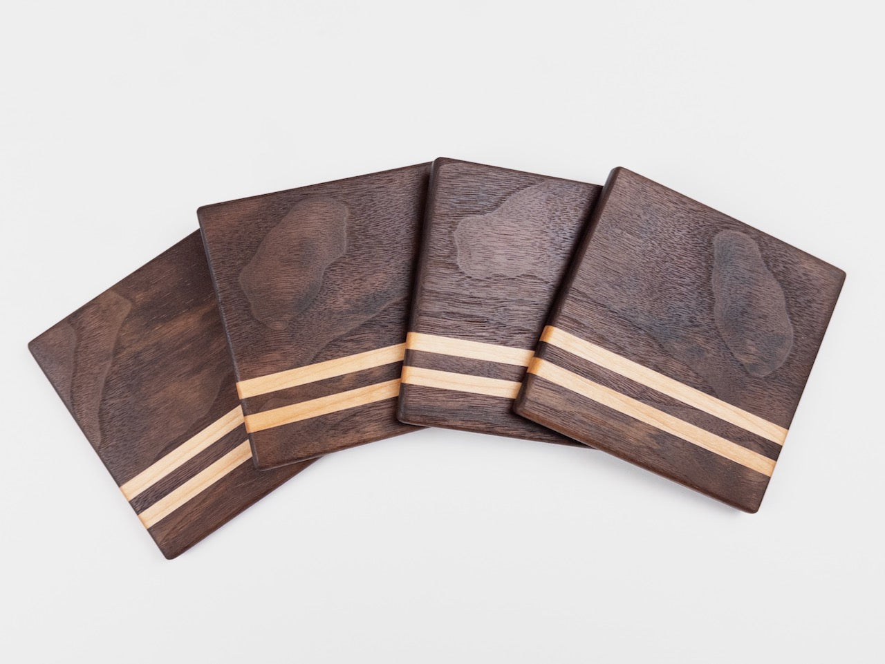 Top view of Walnut Coasters with Maple Stripe Set of 4